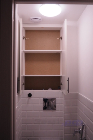 Шкафчик за унитазом в туалете 600.11 серии паенльного дома